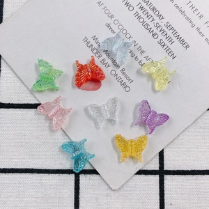 Translucent resin butterfly charms in assorted colors for DIY jewelry making and crafts