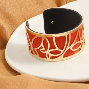 Fashion wide hollow metal cuff with double-sided red and black PU leather insert