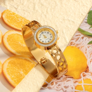 Women's Luxury Gold Bangle Watch Rhinestone Bezel Roman Numeral Hollow Circle Strap Stainless Steel Quartz Watch Jewelry