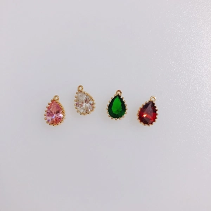 Pear cut colorful cubic zirconia teardrop charms in gold plated settings for DIY jewelry