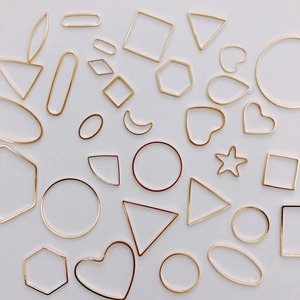 Assorted gold geometric metal charms for DIY resin jewelry making and earring crafts