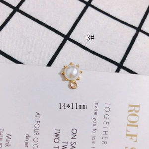 Detail of 14x11mm sunburst pearl pendant with S925 silver needle and gold metal frame