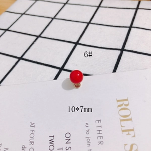 Macro detail of 6# red spherical pearl pendant with gold ring, 10x7mm size S925 silver pin