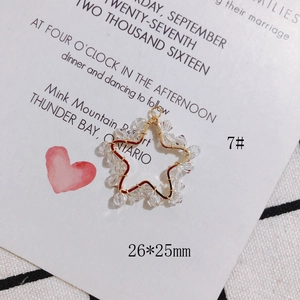 Macro shot of 26x25mm gold wire wrapped star pendant with crystal beads for jewelry DIY