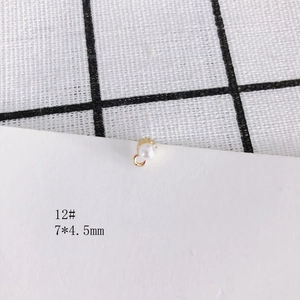 Detailed macro view of 12# white pearl pendant with 7x4.5mm gold base for DIY jewelry