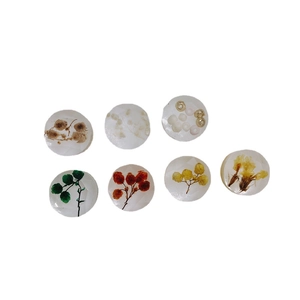Handmade transparent resin round charms with colorful dried flowers and decorative beads