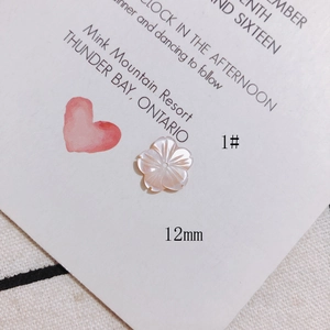 Detailed view of a 12mm carved pink shell flower bead for DIY jewelry making
