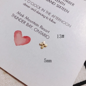 Detailed view of a 5mm clover leaf mother of pearl accessory for jewelry making