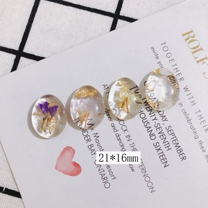 Ovale transparente Kunstharz-Cabochons mit lila Trockenblumen und Goldfolie, 21x16mm DIY