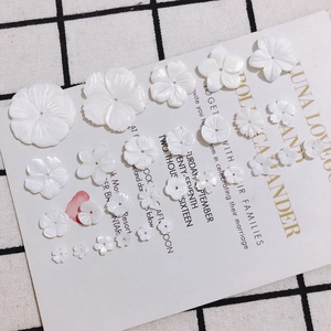 Fleurs en nacre blanche de tailles variées pour bijoux DIY et accessoires faits main