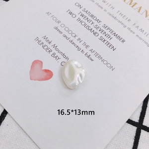 Macro detail of a 16.5x13mm baroque pearl with iridescent luster for DIY jewelry