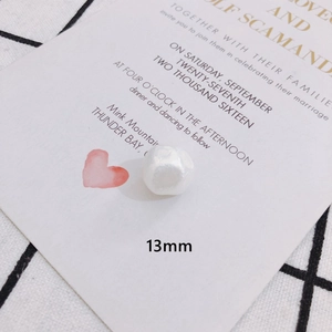 Macro shot of 13mm white irregular baroque faux pearl bead for DIY jewelry making