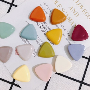 Colorful triangle resin charms for DIY phone cases and jewelry in assorted candy colors