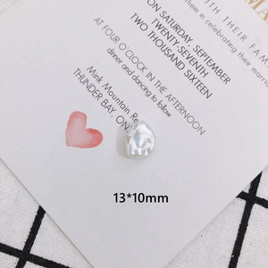 Detail of 13x10mm white baroque faux pearl pendant for DIY jewelry and hair accessories