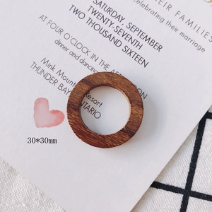 Close-up of 30mm dark brown geometric round wooden hoop for DIY earring making