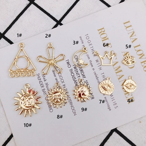 Set of 10 gold plated sun moon and star celestial charms for DIY jewelry making