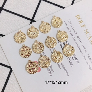 Set of 12 gold plated 18K zodiac charms with relief design for DIY jewelry making