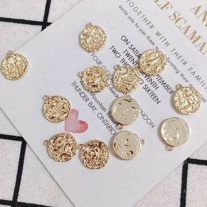 18K gold-plated retro 12 zodiac charms with embossed detail for DIY jewelry making