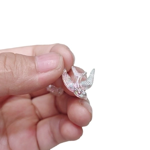 Iridescent bird-shaped DIY jewelry charms with colorful translucent rainbow finish