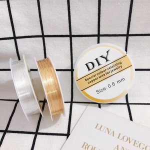 Detailed view of 0.6mm gold and silver tarnish resistant copper wire for DIY jewelry