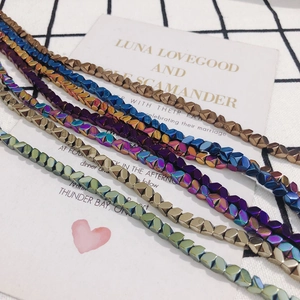 Irregular multifaceted 4x4mm hematite beads in metallic gold, blue, and purple tones