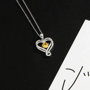 Silver stainless steel heart necklace with yellow zircon stone and pave crystals