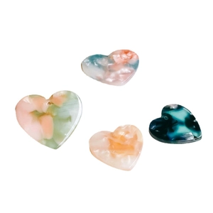 Assorted heart-shaped marbled acetate pendants for DIY jewelry making and earrings