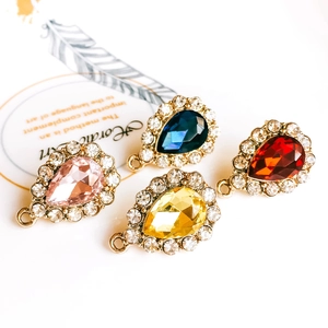 Set of four colorful teardrop crystal pendants with rhinestone borders for DIY jewelry