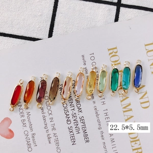 22.5x5.5mm oval crystal pendants with gold copper trim and double loops for DIY jewelry