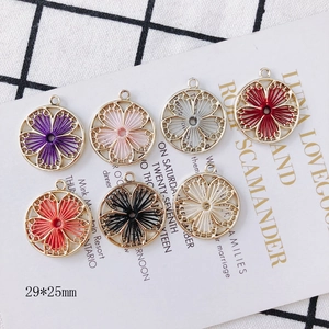 Colorful woven round alloy pendants for DIY earrings in seven vibrant ethnic styles