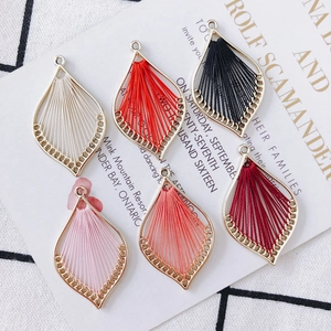 Bohemian leaf-shaped embroidered earring pendants with gold metal frames in six vibrant colors