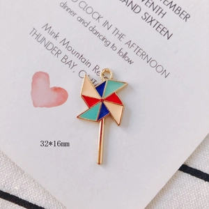 Detailed size view of colorful enamel windmill pendant charms for DIY jewelry 32x16mm