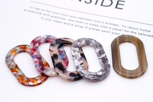 Lot de breloques ovales en résine aux textures variées pour accessoires bijoux DIY