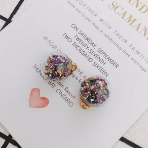 Colorful glitter-filled glass ball pendants with gold metal loops for DIY jewelry making
