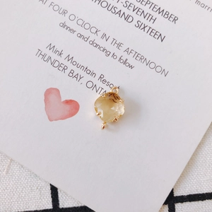 Detail of cushion-cut yellow crystal pendant with 18k gold-plated double rings for DIY jewelry