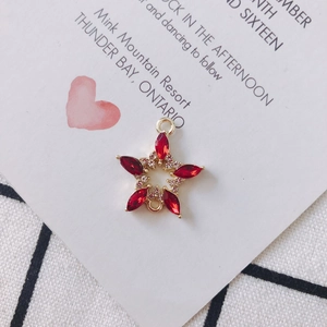 Star-shaped golden pendant with red marquise stones and white diamonds for DIY jewelry