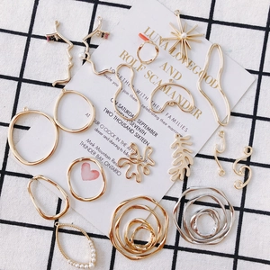 DIY Goldene geometrische Anhänger und abstrakte Gesichtsformen für Schmuckherstellung