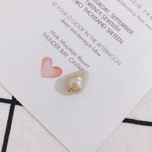 Macro view of teardrop imitation pearl bead with marble texture for DIY jewelry