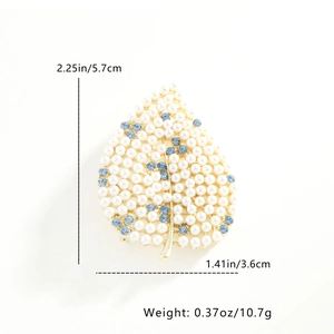 Detailed size specifications of leaf brooch with white faux pearls and blue rhinestones