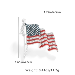 Detail showing dimensions and silver flag brooch with red and white rhinestones