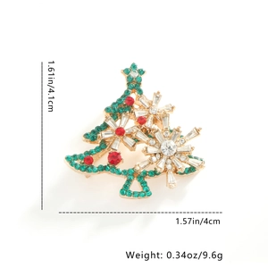 Detailed view of rhinestone Christmas tree brooch showing dimensions of 4.1cm by 4cm