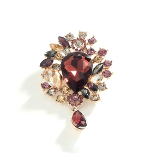 Elegant gold-tone brooch with vintage purple waterdrop crystals and rhinestone accents
