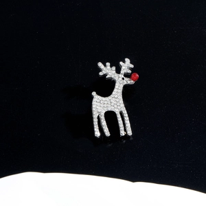Elegant silver reindeer brooch with sparkling rhinestones and a festive red nose detail