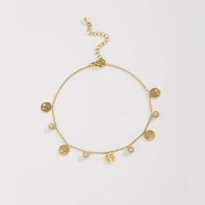 Golden Tree of Life anklet with white crystal accents and adjustable chain on white background