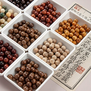 Detailed close-up of 10mm assorted natural wood beads for DIY jewelry bracelet making