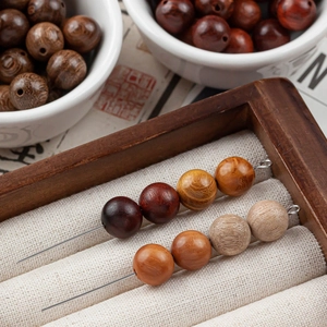 Assorted 10mm natural wood beads in multiple colors for DIY jewelry making