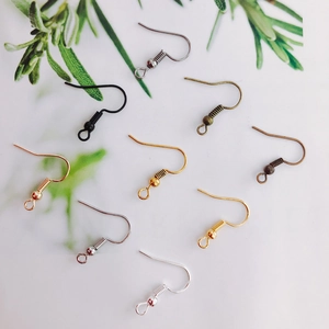 Macro shot of assorted plating earring hooks in multiple metal colors for DIY jewelry making