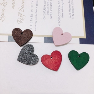 DIY handmade wooden heart charms with hanging holes in five different colors for jewelry making
