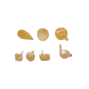 Set of beige resin jewelry components including heart and geometric drops for DIY earrings