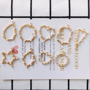 Selection of geometric gold-plated alloy pendants with faux pearls for DIY jewelry making